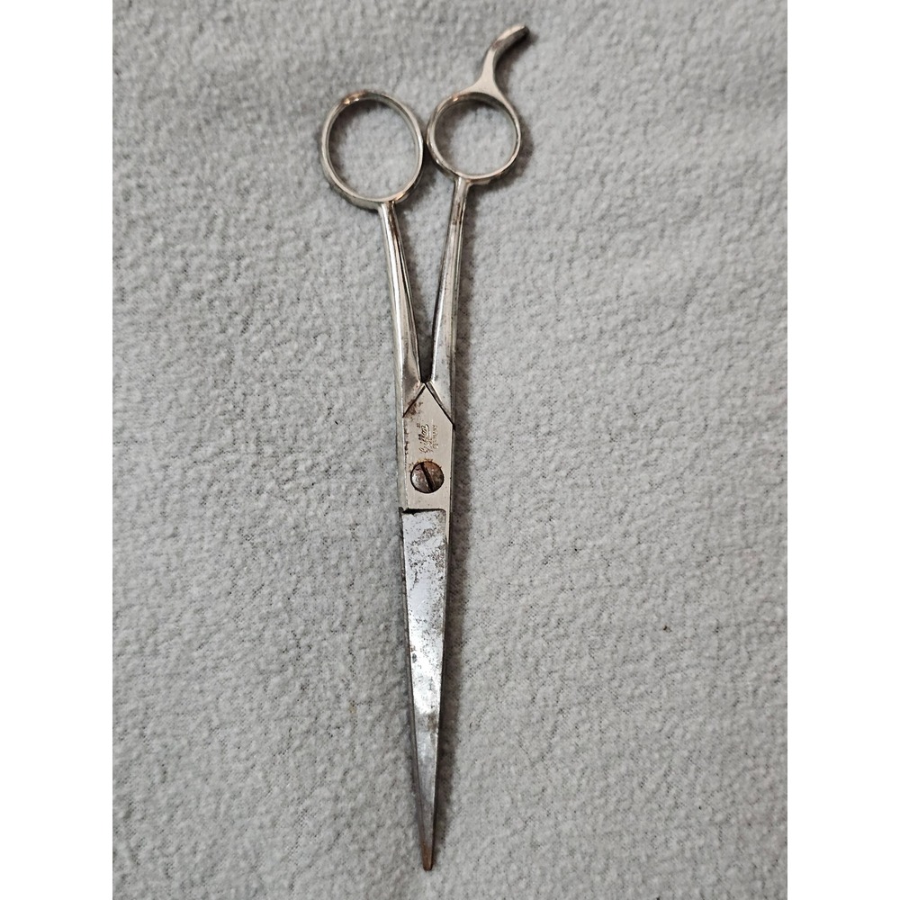 vintage silver metal hair scissors manufactured by Griffon in Germany collect